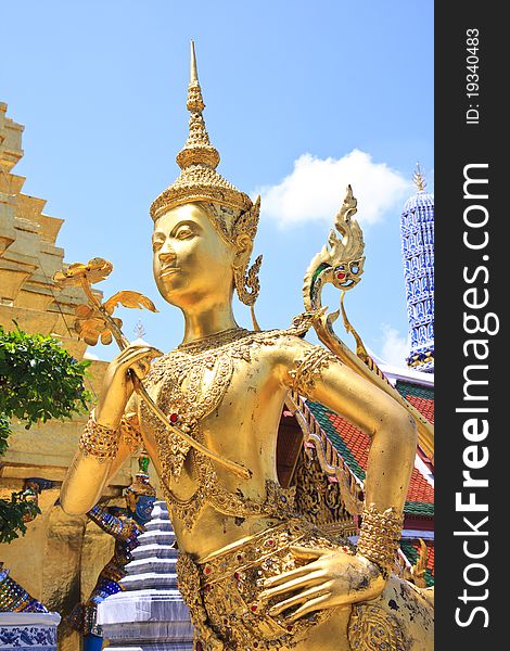 A Golden Kinnari statue at Wat Phra Kaew , Bangkok, Thailand. A Golden Kinnari statue at Wat Phra Kaew , Bangkok, Thailand