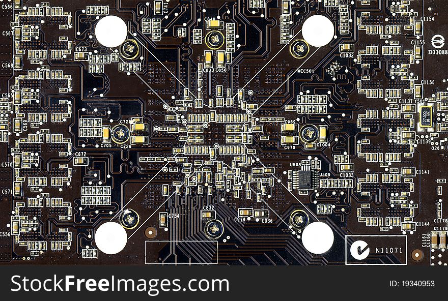 Close-up of computer circuit board in black and brown.