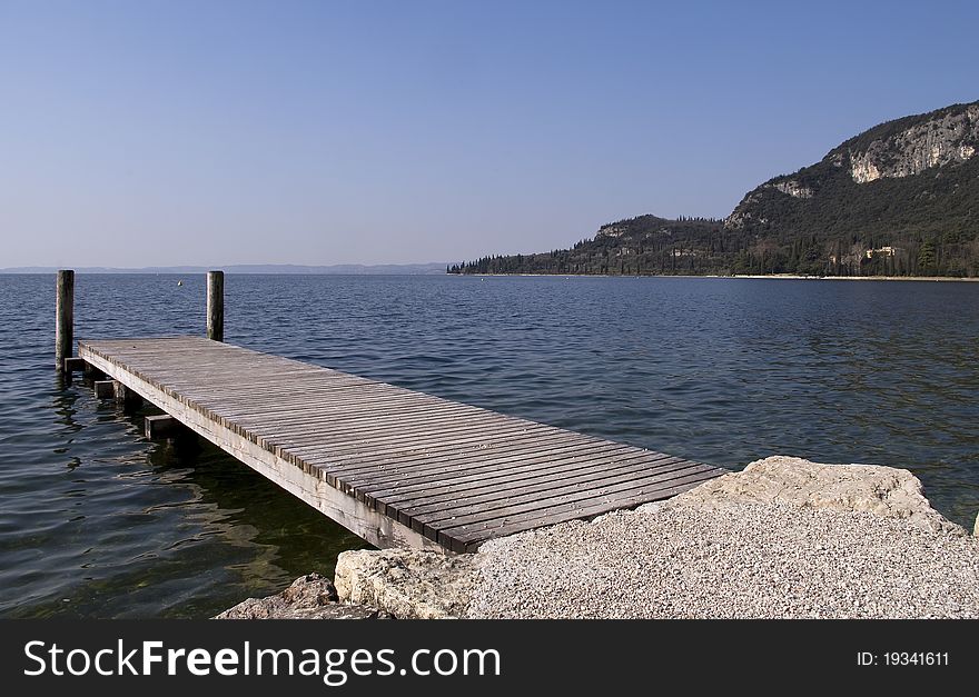 Floating dock near Garda on the lake of Garda, Italy. Floating dock near Garda on the lake of Garda, Italy