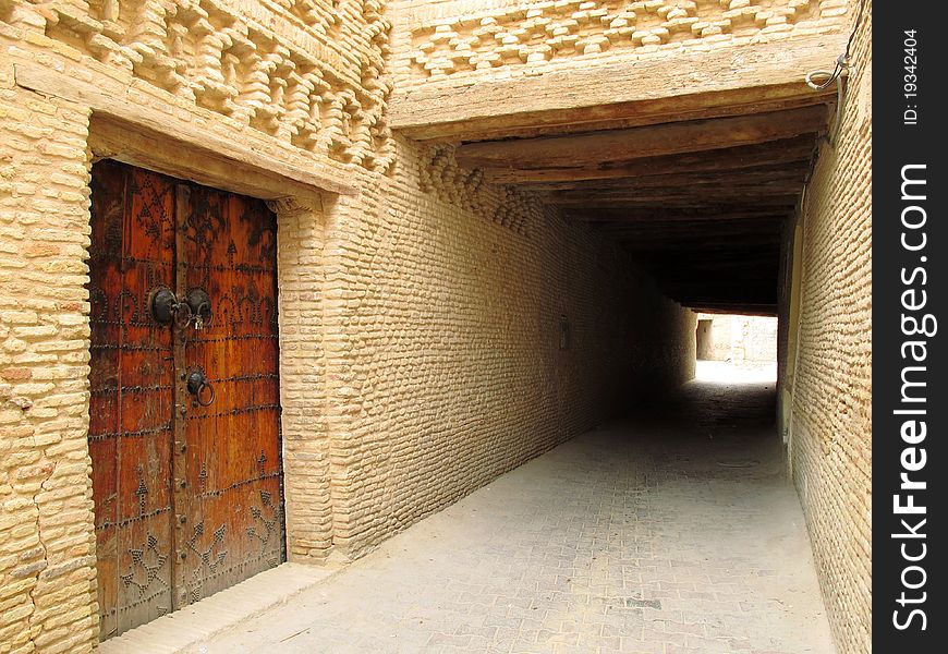 Old passage way in an ancient town in Tunesia. Old passage way in an ancient town in Tunesia