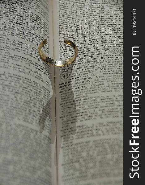 Ring In A Book With  Hand Shadow