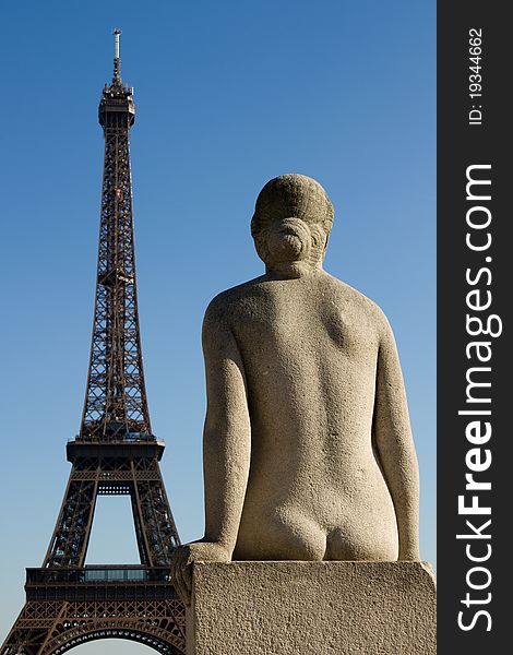 Statue And Eiffel Tower