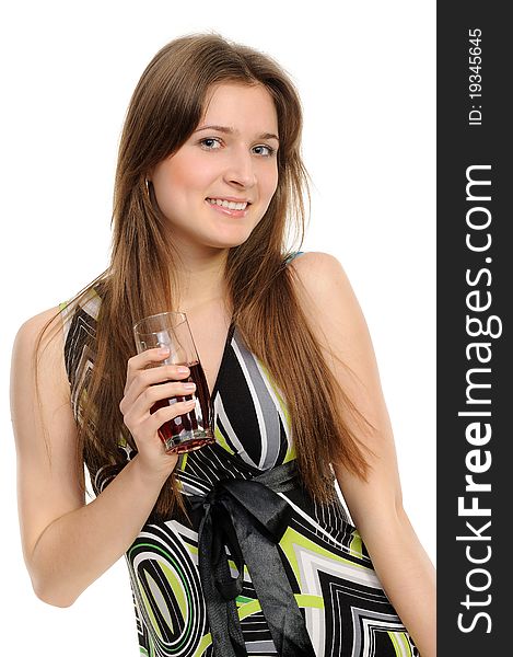 Girl with glass of juice isolated against white background. Girl with glass of juice isolated against white background