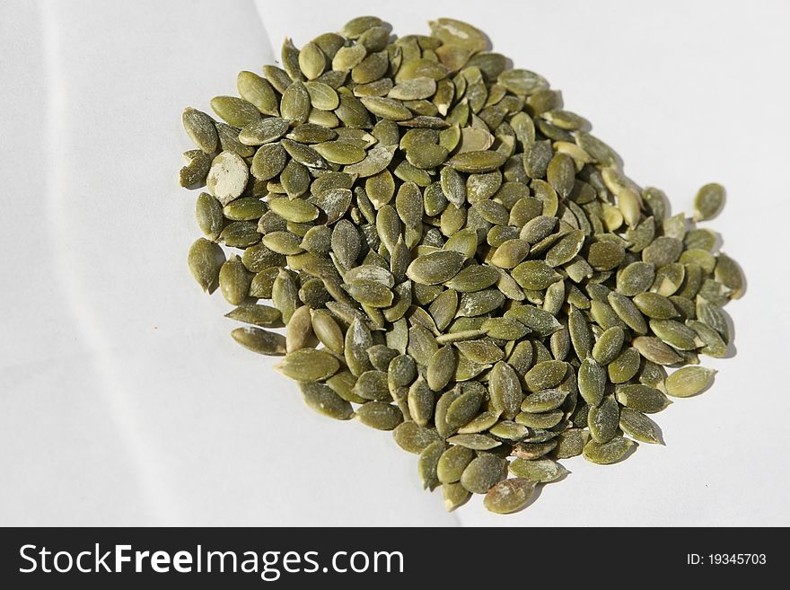 Pumpkin seeds isolated on white background