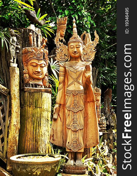 Wood engrave art the traditional Thai style on temple door or house in Thailand