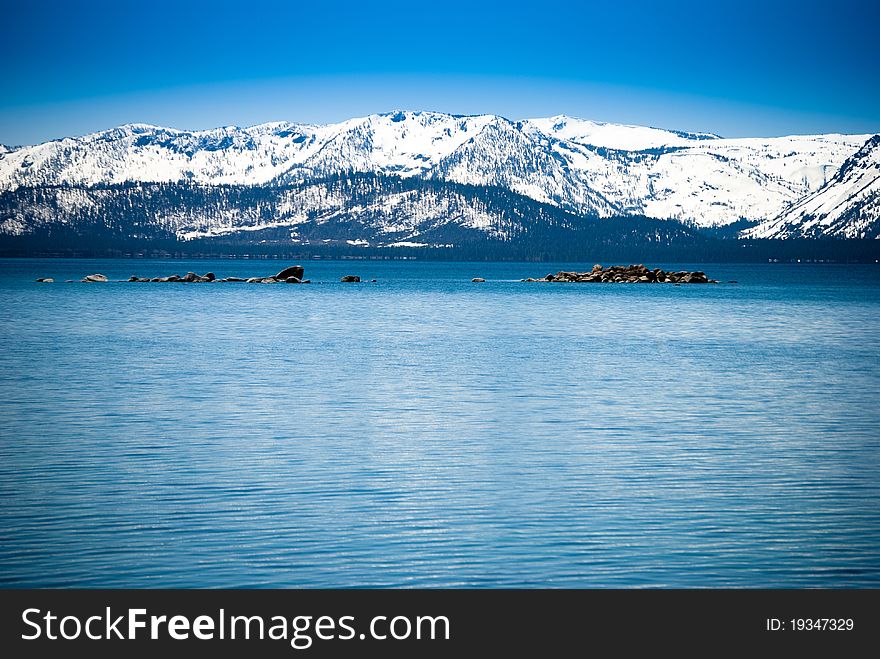 Lake Tahoe Mountain Background with Snow Cap Mountain. Lake Tahoe Mountain Background with Snow Cap Mountain.