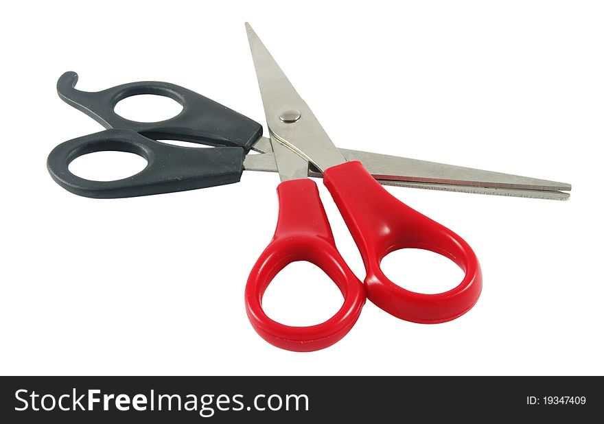 Two scissors isolated over white surface