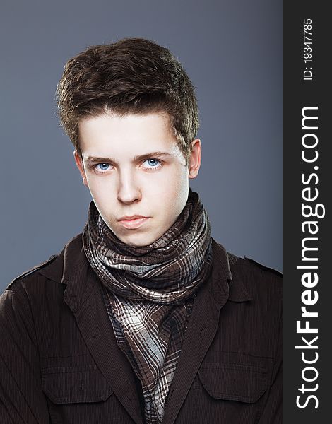 Young Man Wearing Elegant Shirt And  Scarf