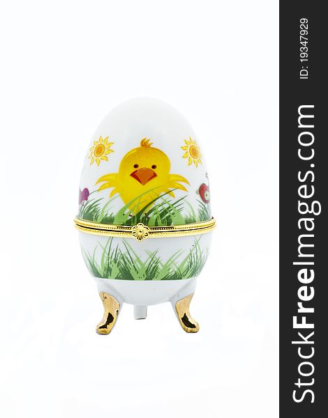 Easter Egg in Decorative Egg Holder isolated on white background. Easter Egg in Decorative Egg Holder isolated on white background