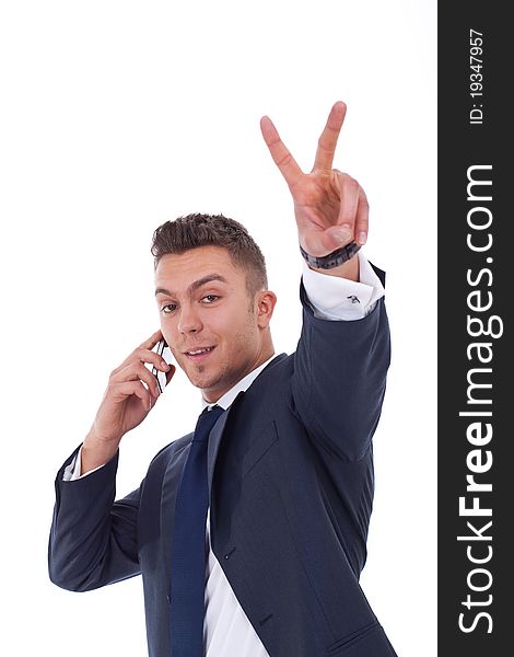 Businessman making victory sign