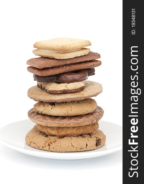 Tower of different types of biscuit on a white background. Tower of different types of biscuit on a white background