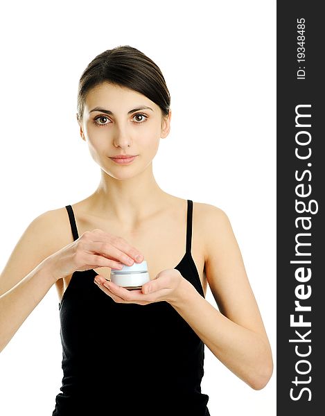 An image of a young woman with facial cream. An image of a young woman with facial cream