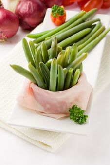 French Beans With Wrapped Ham Royalty Free Stock Photography French Beans With Wrapped Ham Royalty Free Stock Photography