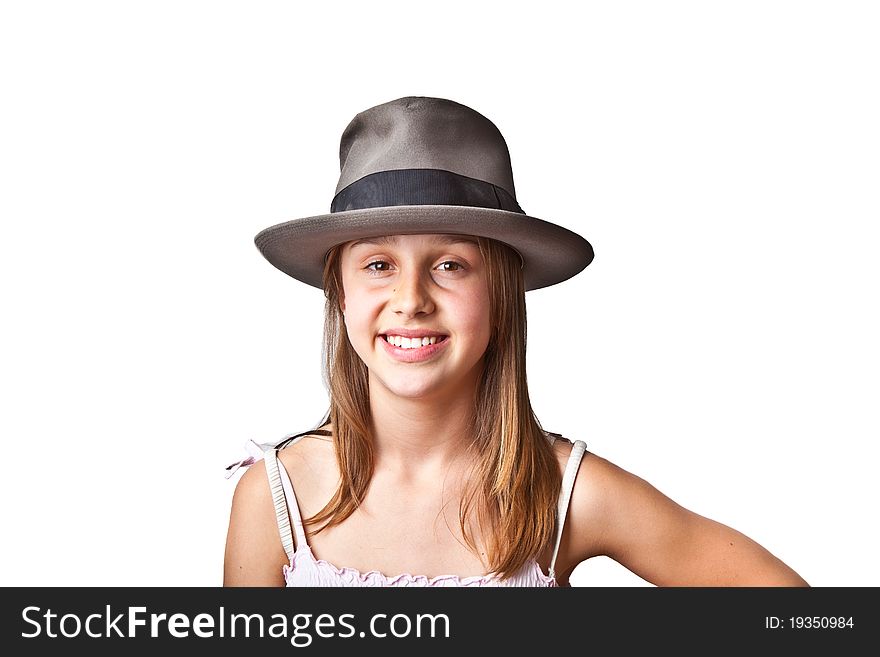 Portrait of cute young teenage girl with hat