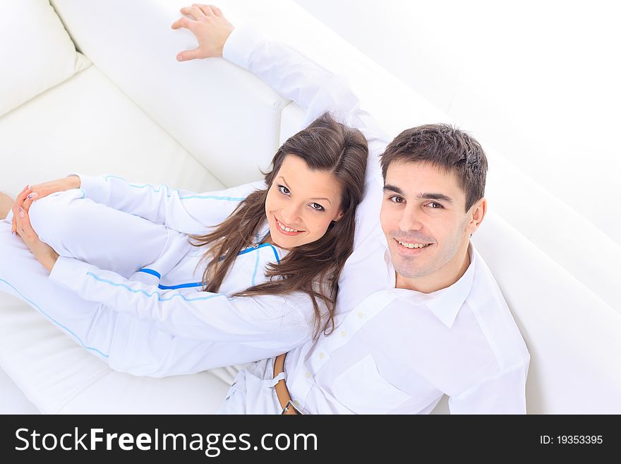 Couple indoors smiling beauty female