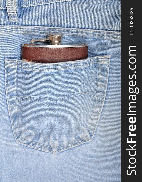 Flask close up in a hip-pocket of jeans