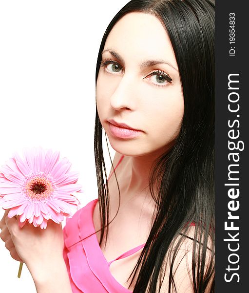 Beautiful young woman on a white background