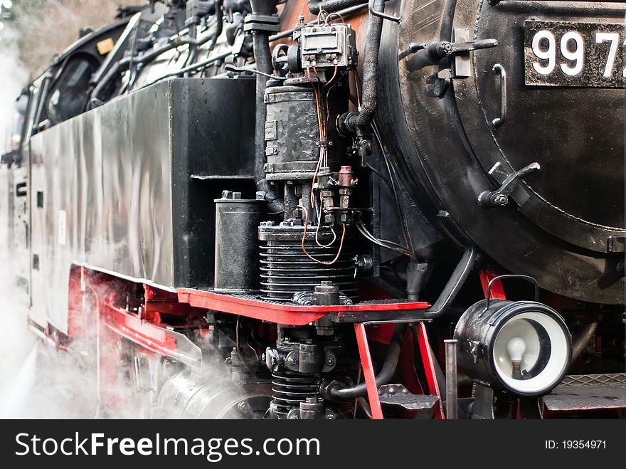 An old steam locomotive close up