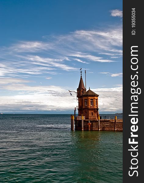 Harbour exit in Constance before blue sky in Lake of Constance. Harbour exit in Constance before blue sky in Lake of Constance