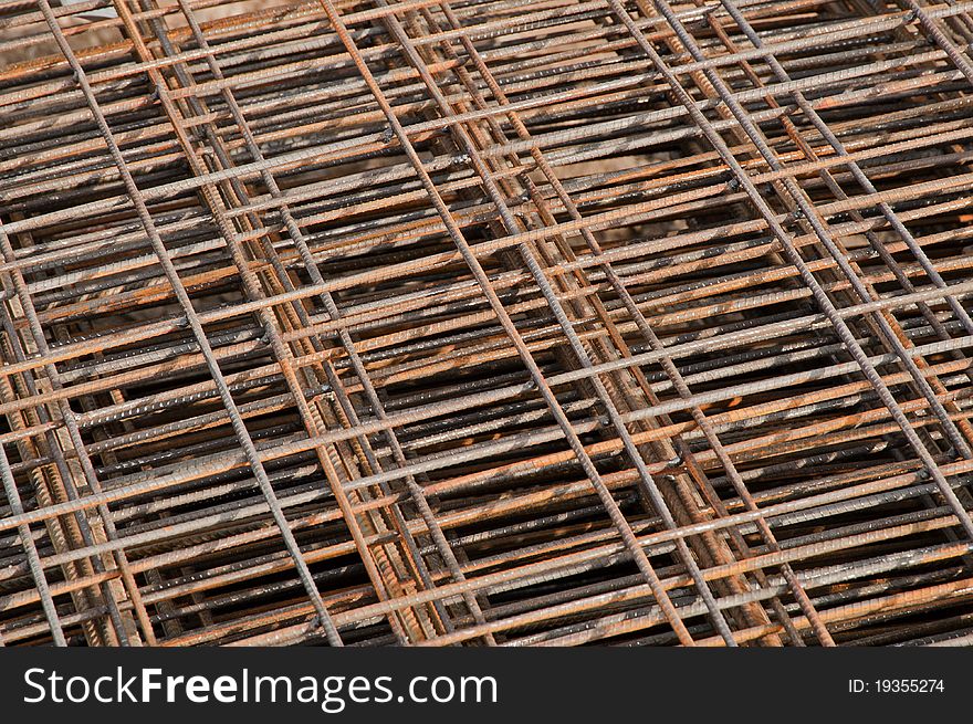 Stack of reinforcing bar mesh in a construction site. Stack of reinforcing bar mesh in a construction site