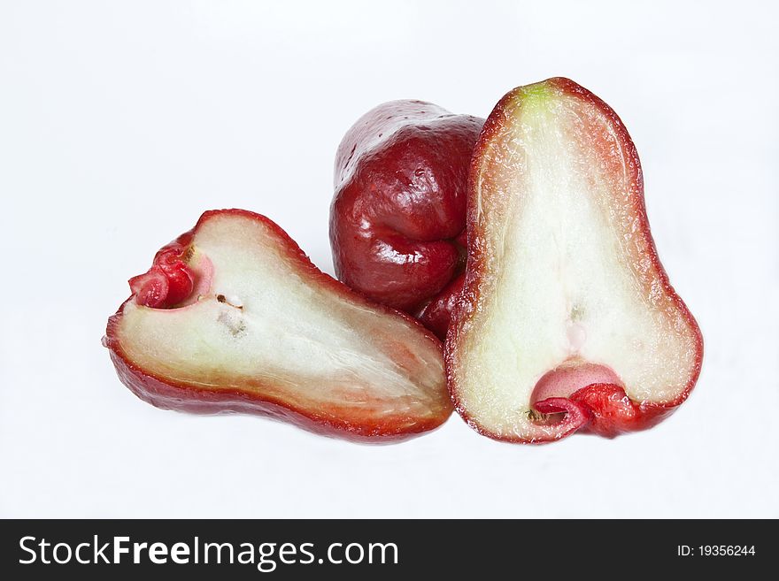 Two washed red Java apples isolated against a white background. Two washed red Java apples isolated against a white background