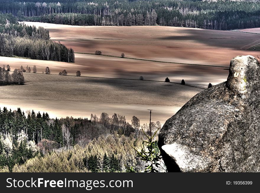View of European countryside, surrealistic colors, HDR style.
