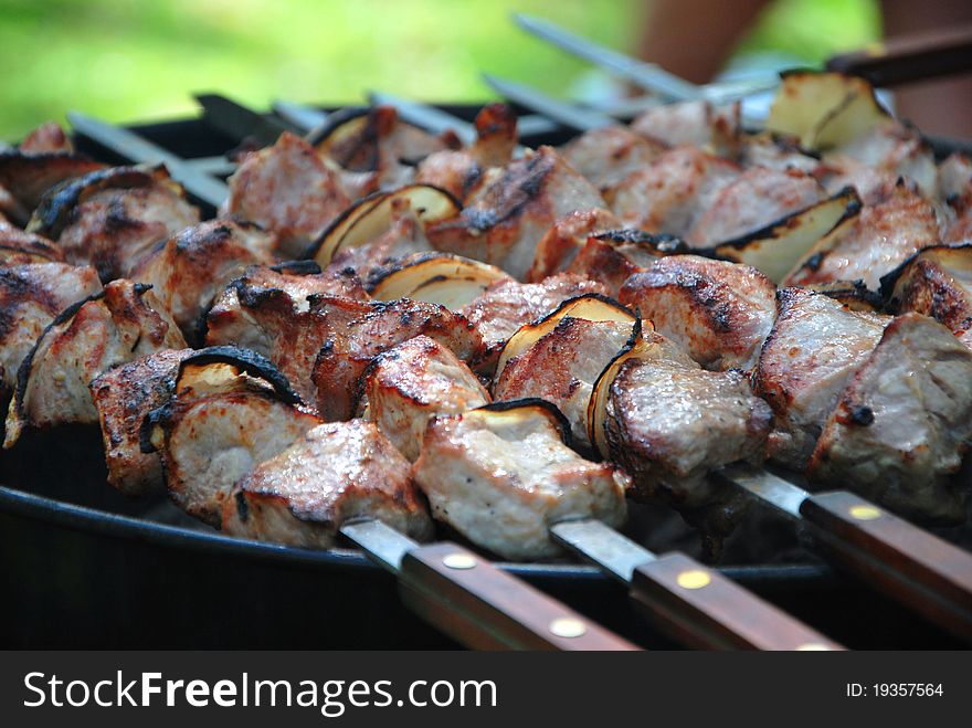 Juicy slices of meat barbecue prepare on fir