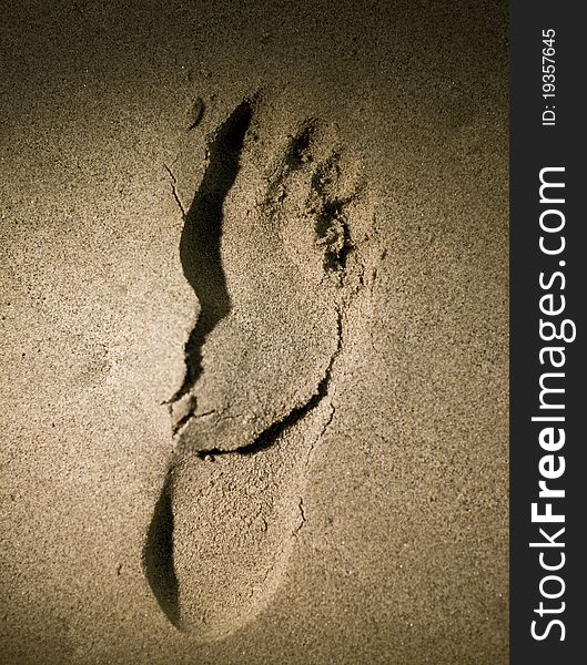 Foot print on the sand on the beach. Foot print on the sand on the beach