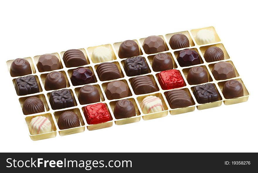Sweet and beautiful chocolates variety flavor in a cute box isolated on white background. Sweet and beautiful chocolates variety flavor in a cute box isolated on white background
