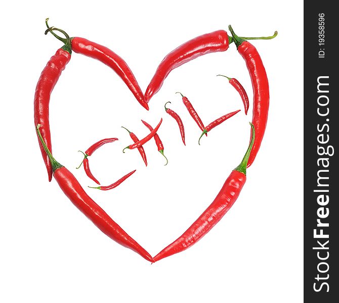 Chili peppers forming shape of heart, over white