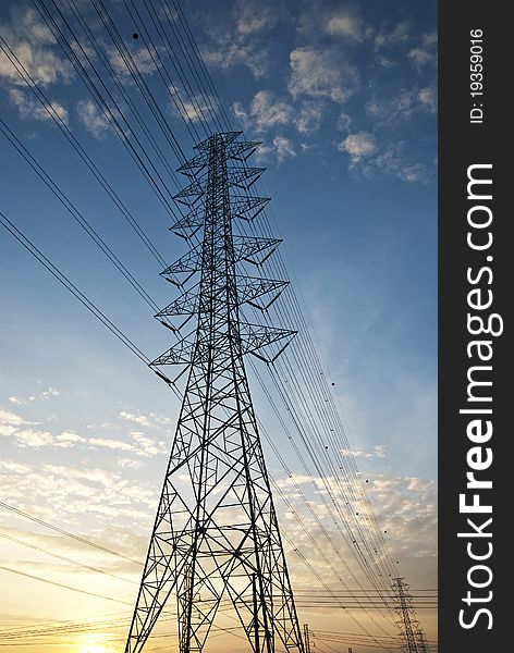 High voltage electric tower under sunset. High voltage electric tower under sunset