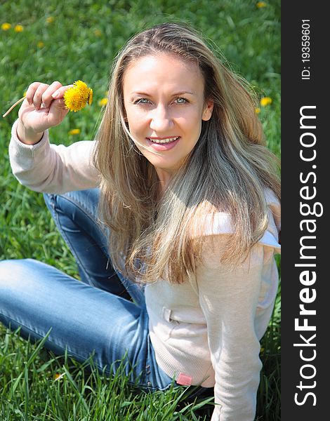 Young Beautiful Woman In  Field