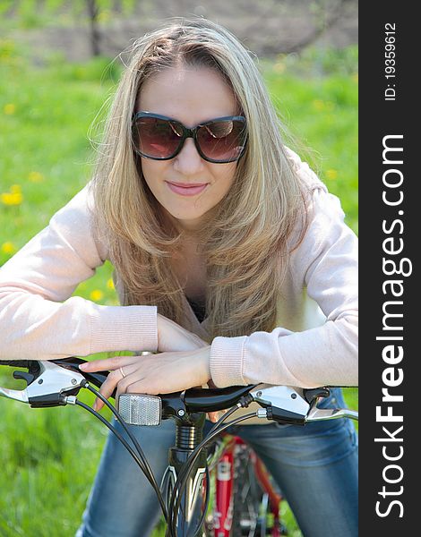 Young Woman With Bicycle