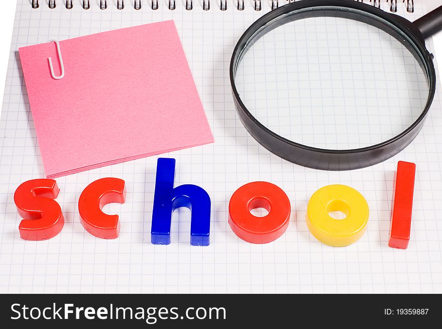 Magnifier on a school writing-book