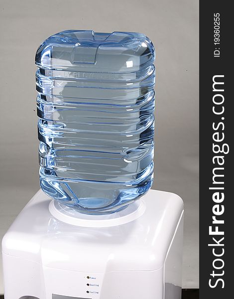 Large bottle of water on a silver background