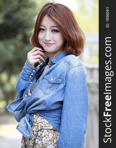 Chinese fashion girl outdoor portrait.