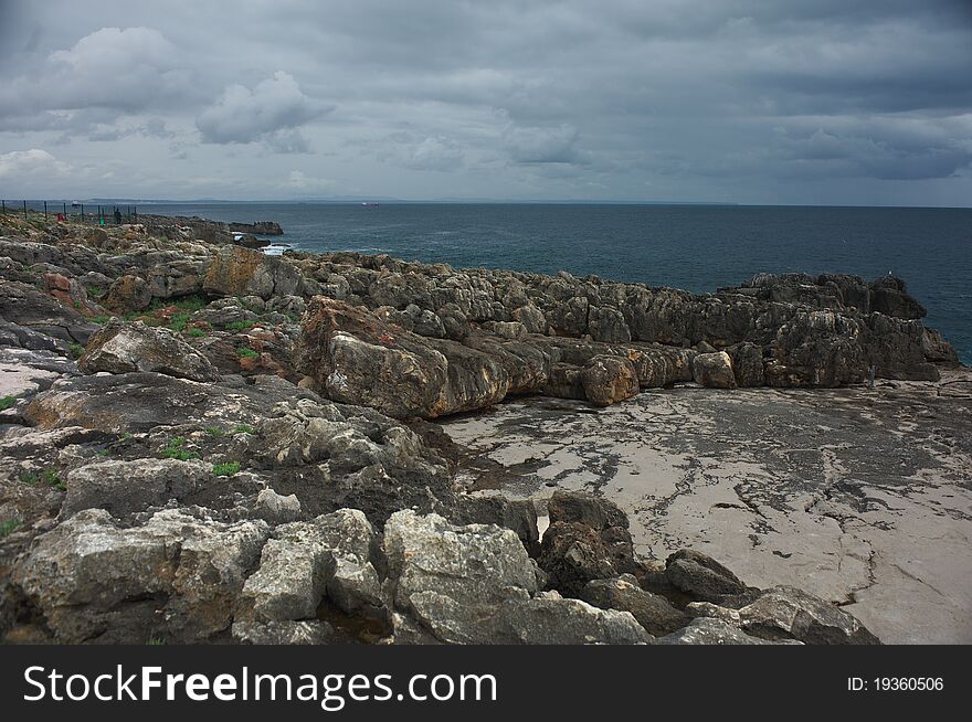 Rocky Portugal shore of Atlantic ocean. Rocky Portugal shore of Atlantic ocean