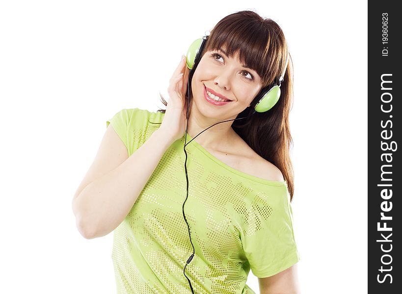 Beautiful girl with green headphones, white background