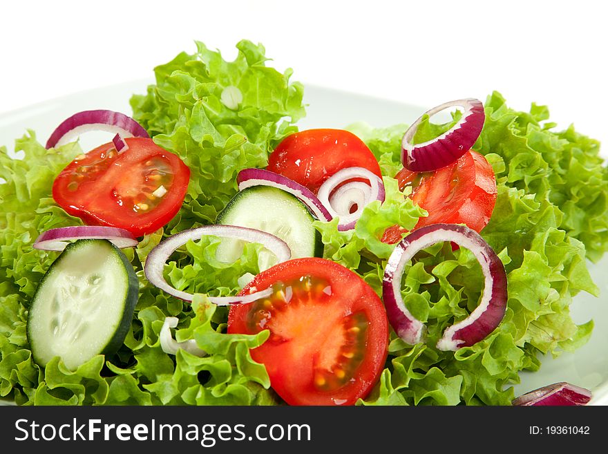 A closeup view from a salad plate. A closeup view from a salad plate.