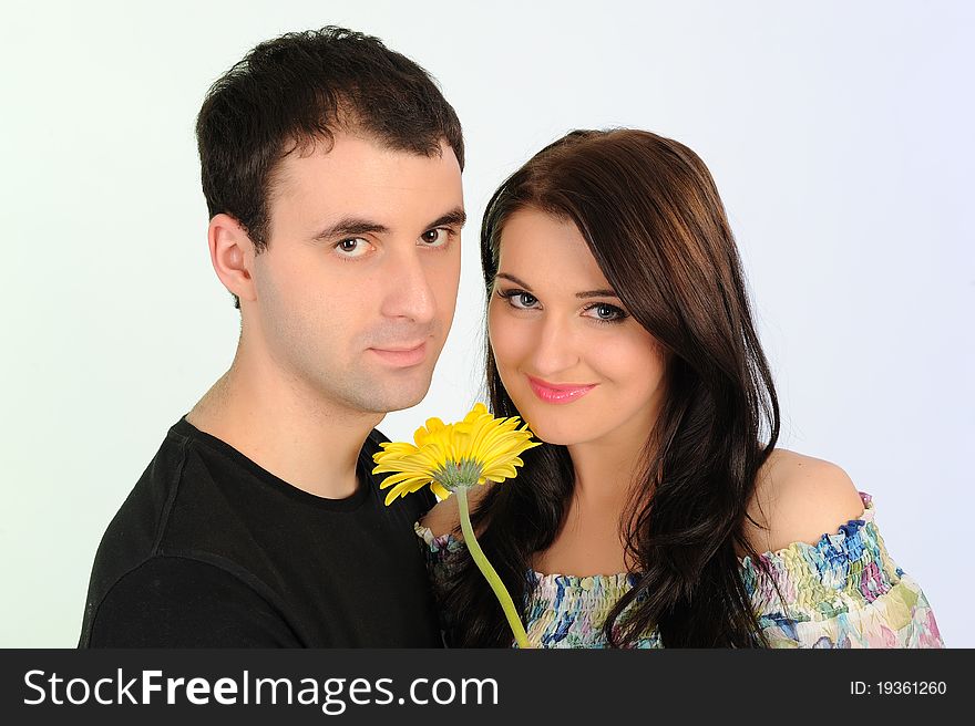 Lovely romantic couple with flower embracing. family photo