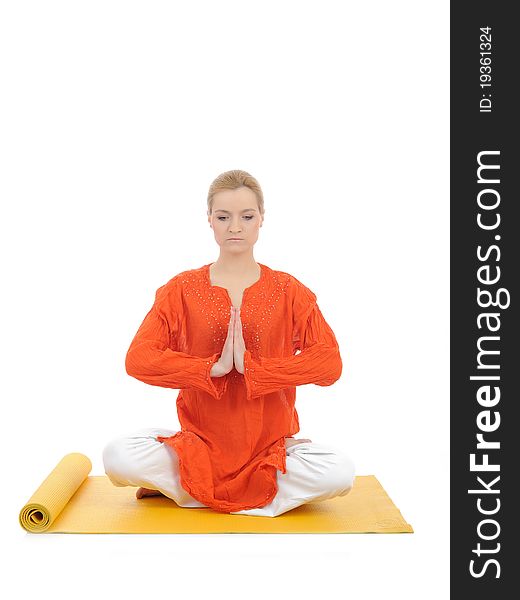 Series or yoga photos. young meditating woman on yellow pilates mat. Series or yoga photos. young meditating woman on yellow pilates mat