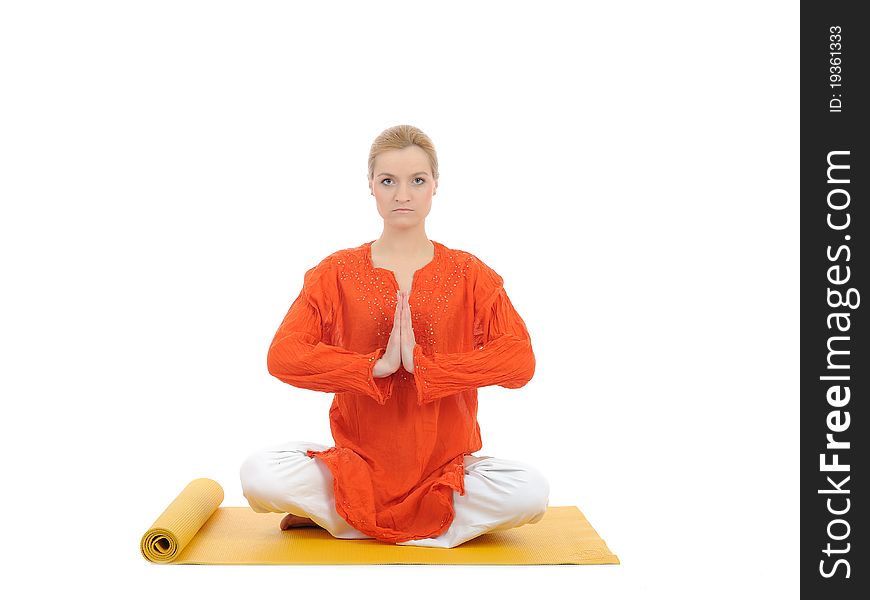 Series or yoga photos. young meditating woman on yellow pilates mat. Series or yoga photos. young meditating woman on yellow pilates mat