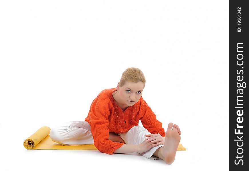 Series or yoga photos. young woman streching on yellow pilates mat. Series or yoga photos. young woman streching on yellow pilates mat