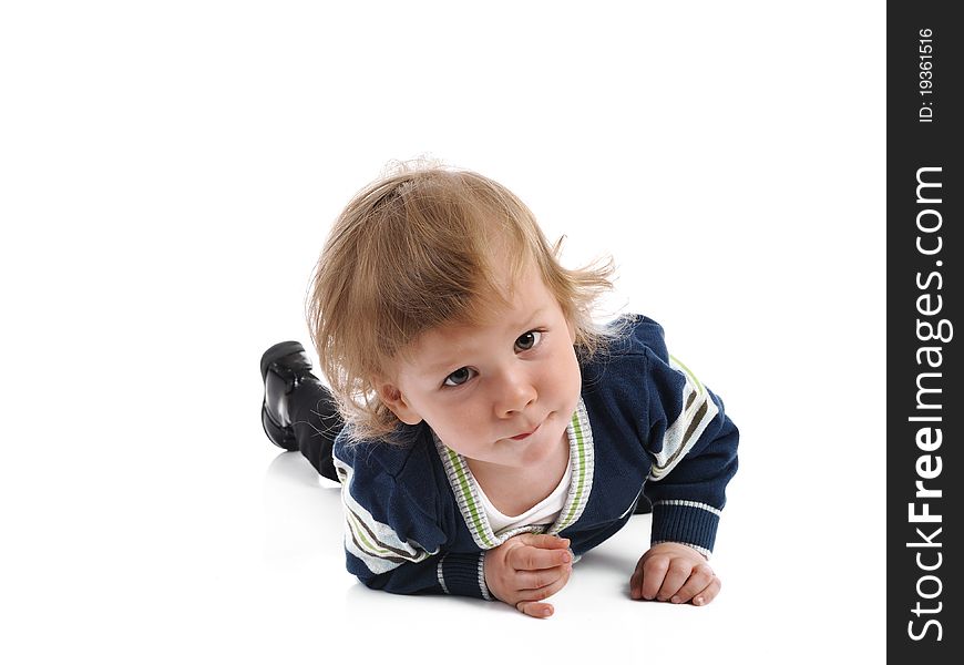 Cute Little Child Smiling On The Floor . Isolated