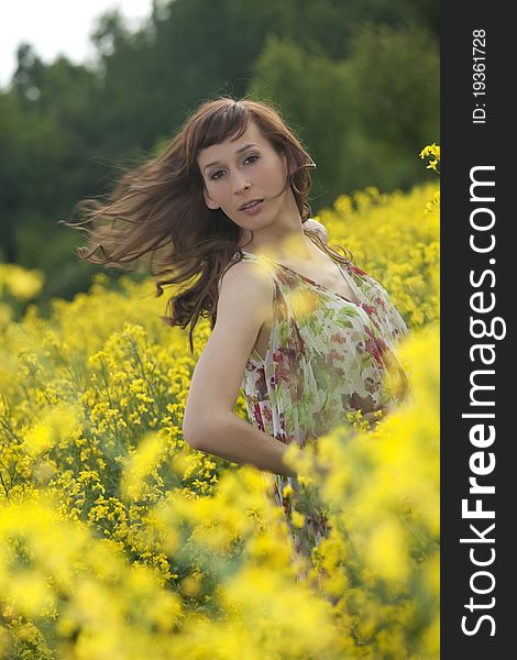 Woman running through summer yellow field. Woman running through summer yellow field