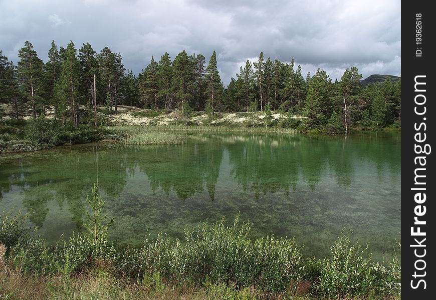 Lake in the forest-picture from Norway