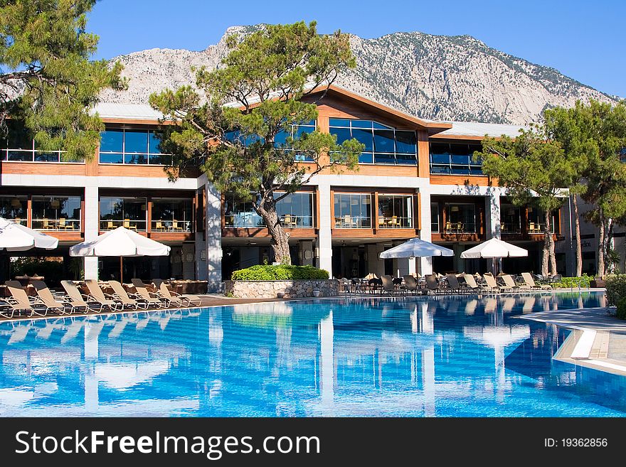 Swimming pool at mediterranean summer resort hotel in Turkey. Swimming pool at mediterranean summer resort hotel in Turkey