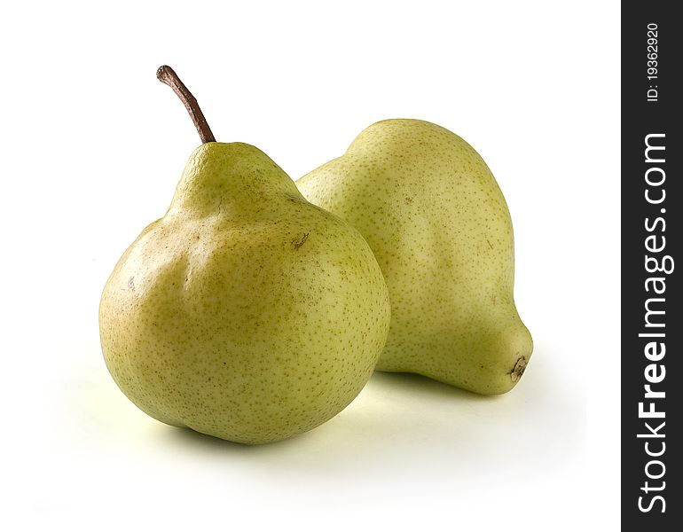 Two yellow pears on the white background