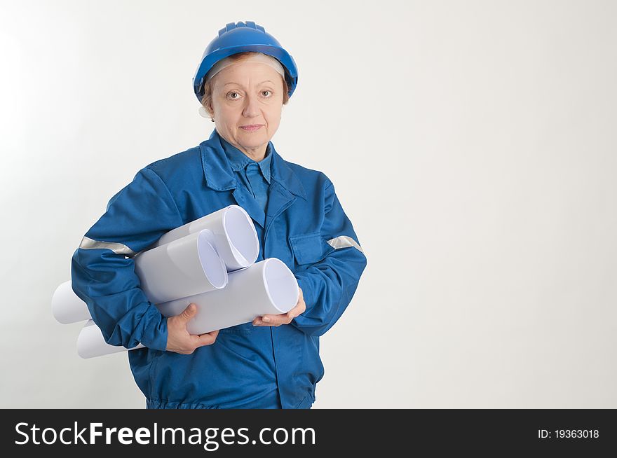 Adult engineer woman holding design plans