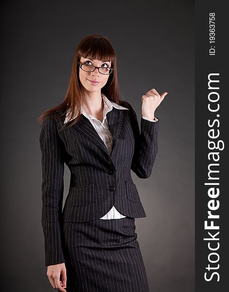 Thoughtful business woman, studio shot